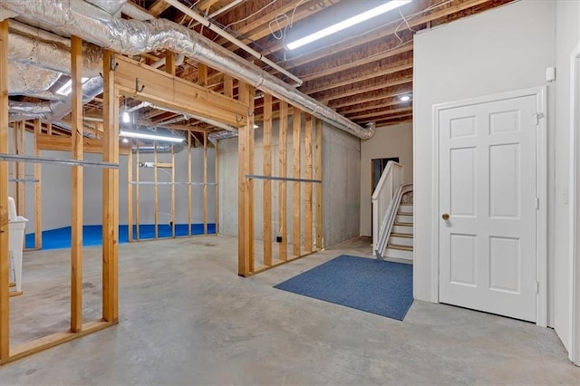 unfinished basement with stairs