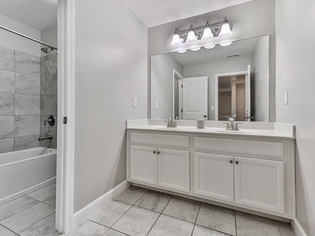 bathroom with double vanity, shower / tub combination, baseboards, and a sink