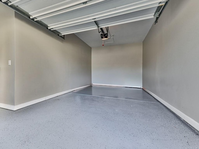 garage featuring baseboards