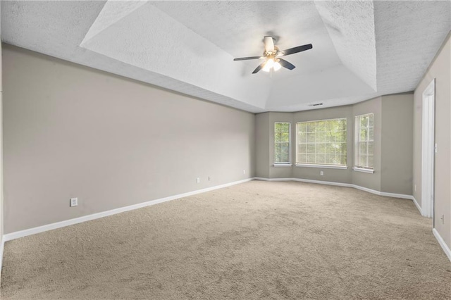 470 Piney Way SW, Atlanta, GA 30331 - carpeted empty room with a tray ceiling, a textured ceiling, a ceiling fan, and baseboards