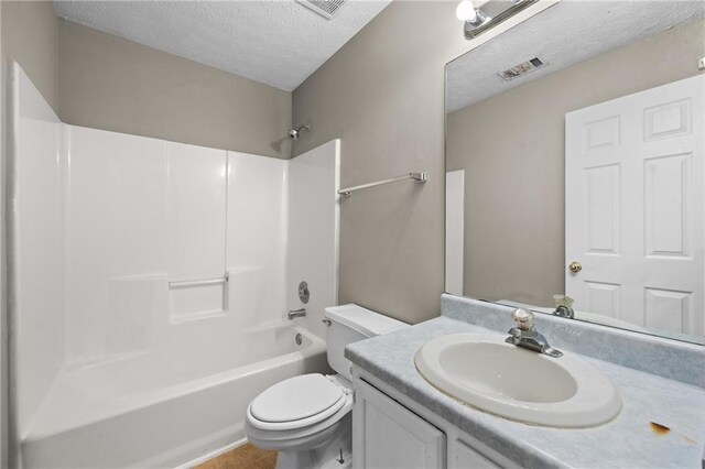 470 Piney Way SW, Atlanta, GA 30331 - bathroom with a textured ceiling, toilet, vanity, and shower / bath combination
