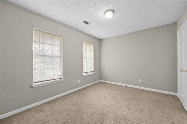 470 Piney Way SW, Atlanta, GA 30331 - carpeted spare room featuring baseboards and a textured ceiling