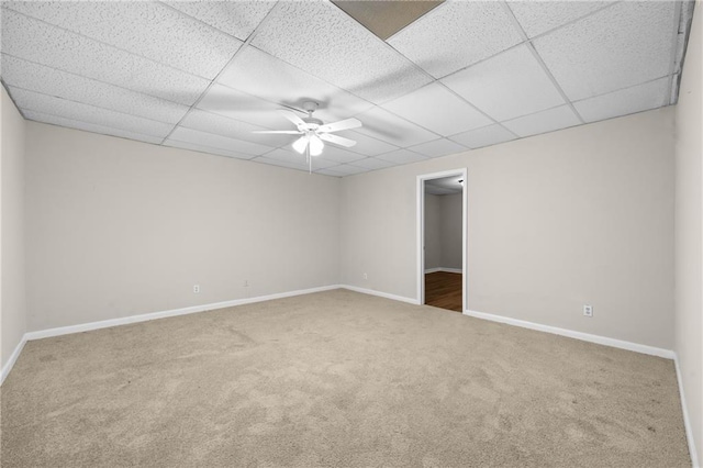 470 Piney Way SW, Atlanta, GA 30331 - carpeted empty room with a drop ceiling, baseboards, and a ceiling fan