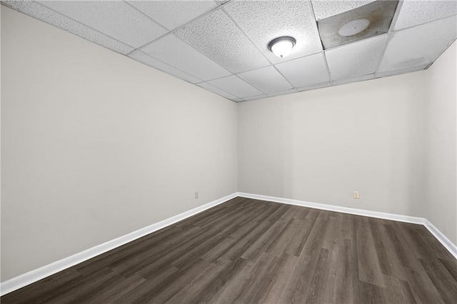 470 Piney Way SW, Atlanta, GA 30331 - unfurnished room with a drop ceiling, dark wood-style flooring, and baseboards