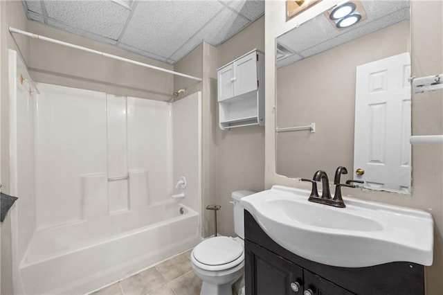 470 Piney Way SW, Atlanta, GA 30331 - bathroom featuring a drop ceiling, toilet, tile patterned floors, vanity, and tub / shower combination