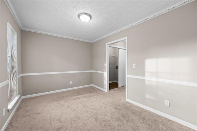 470 Piney Way SW, Atlanta, GA 30331 - spare room featuring carpet flooring, a textured ceiling, crown molding, and baseboards