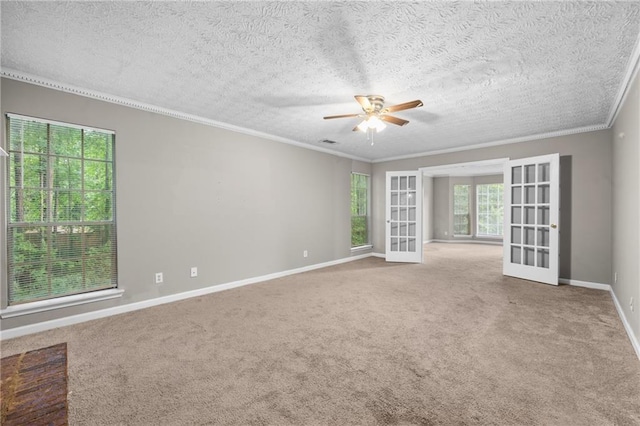 470 Piney Way SW, Atlanta, GA 30331 - carpeted spare room featuring french doors, a ceiling fan, crown molding, baseboards, and a textured ceiling