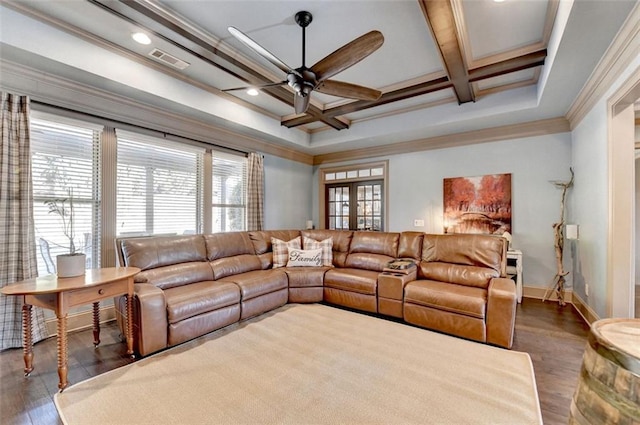 living room with beam ceiling, ceiling fan, coffered ceiling, ornamental molding, and dark hardwood / wood-style floors