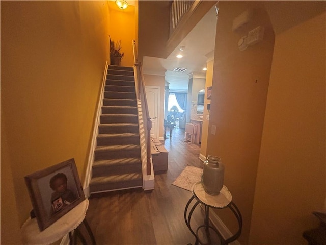 2610 Gadsen Walk, Duluth, GA 30097 - staircase featuring visible vents, baseboards, and wood finished floors