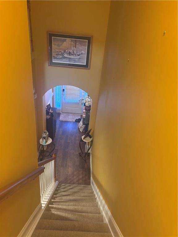 2610 Gadsen Walk, Duluth, GA 30097 - staircase featuring baseboards