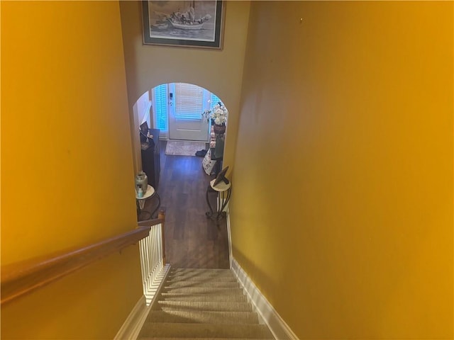 2610 Gadsen Walk, Duluth, GA 30097 - stairs with arched walkways and baseboards