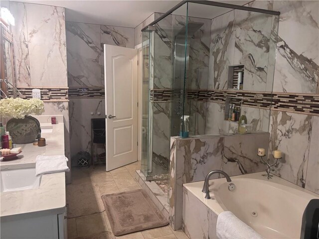 2610 Gadsen Walk, Duluth, GA 30097 - bathroom with tile walls, a marble finish shower, vanity, and a whirlpool tub