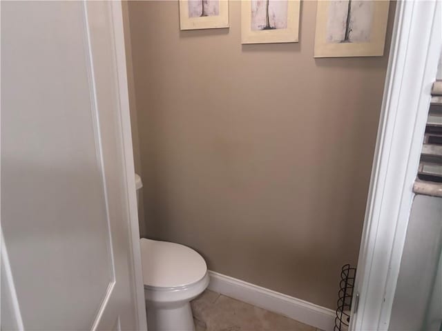 2610 Gadsen Walk, Duluth, GA 30097 - bathroom featuring tile patterned flooring, toilet, and baseboards