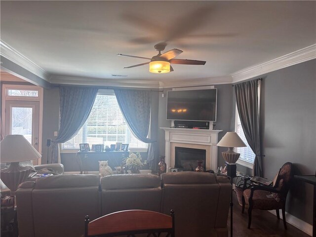 2610 Gadsen Walk, Duluth, GA 30097 - living area with a ceiling fan, a fireplace, a wealth of natural light, and crown molding