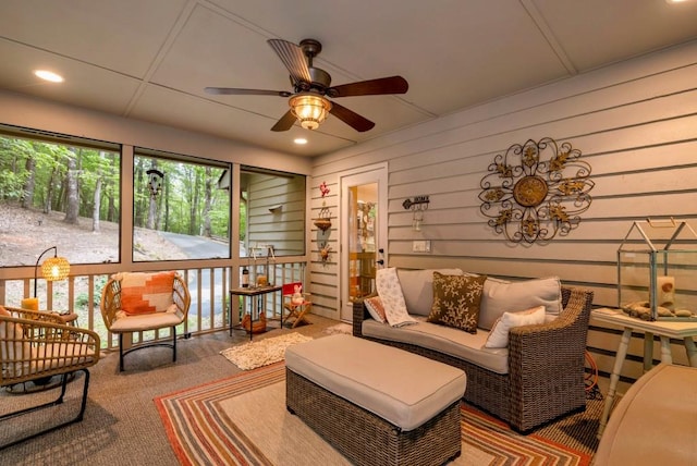 living room featuring ceiling fan