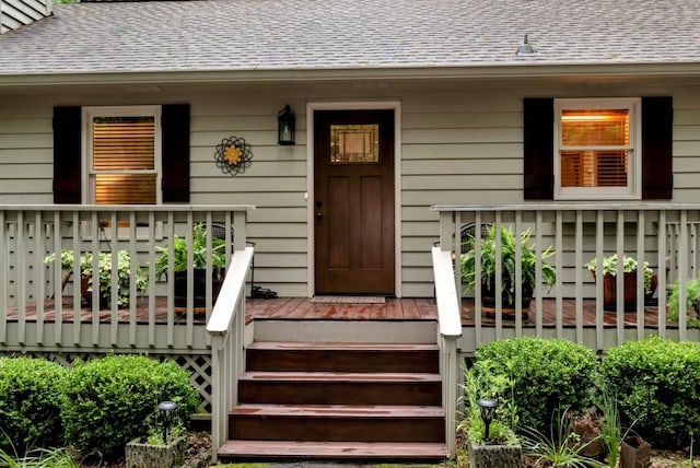 doorway to property featuring a porch