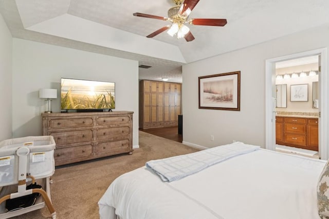 2277 Lazy Days Rd, Dacula, GA 30019 - carpeted bedroom with ensuite bathroom, baseboards, and a ceiling fan
