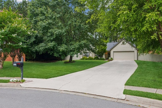 2277 Lazy Days Rd, Dacula, GA 30019 - view of property hidden behind natural elements featuring driveway, a front lawn, and a garage