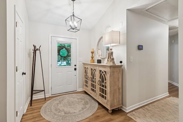 2277 Lazy Days Rd, Dacula, GA 30019 - entryway with light wood-type flooring, a chandelier, and baseboards