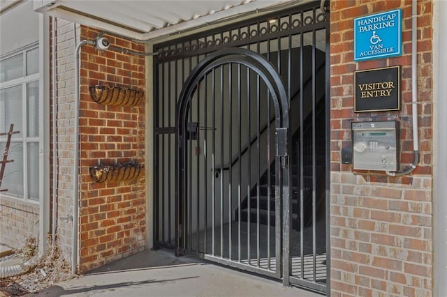840 United Ave SE Unit 401, Atlanta, GA 30312 - doorway to property with brick siding and a gate