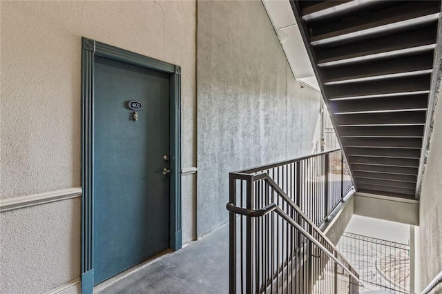 840 United Ave SE Unit 401, Atlanta, GA 30312 - property entrance with stucco siding and a balcony