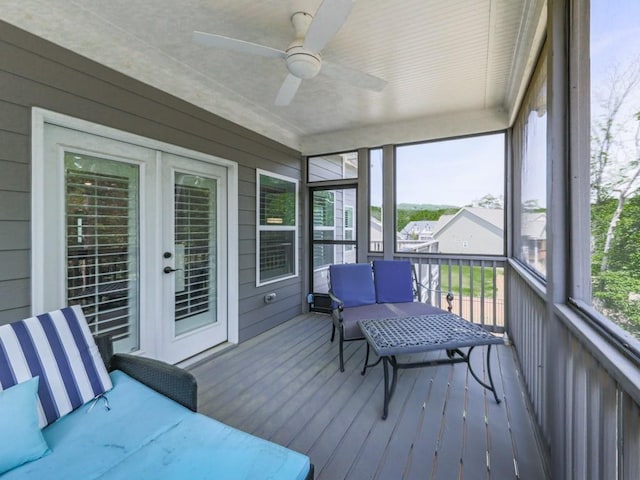 sunroom / solarium with ceiling fan