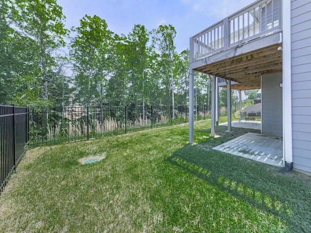 view of yard with a patio area and a deck
