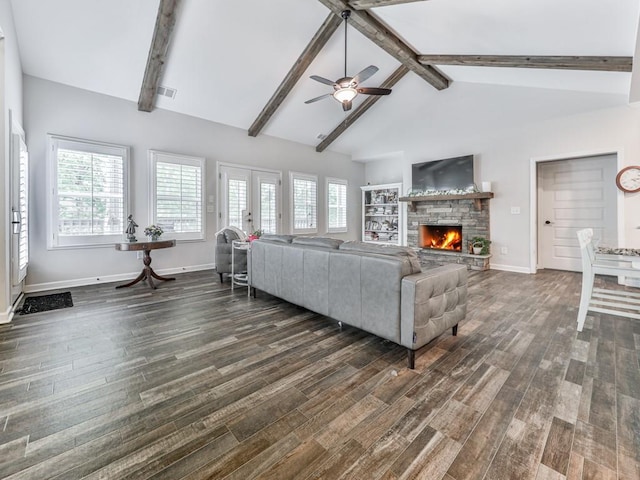 living room with ceiling fan, dark wood-type flooring, a fireplace, and baseboards