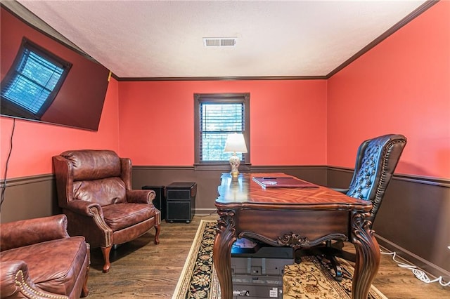 office space featuring ornamental molding and wood-type flooring