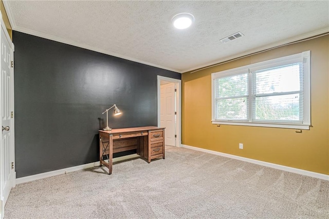 office featuring ornamental molding, a textured ceiling, and light colored carpet