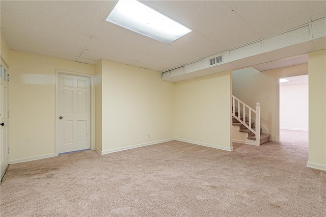 basement with carpet flooring