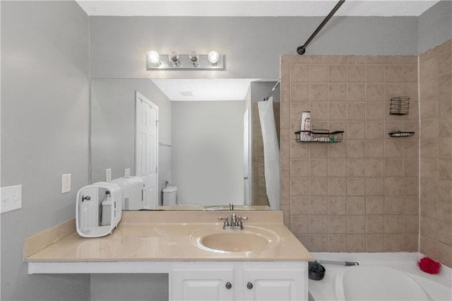 full bathroom featuring shower / bath combo with shower curtain, vanity, and toilet