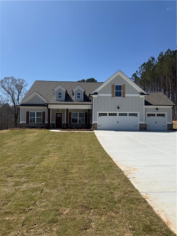 craftsman house featuring a garage