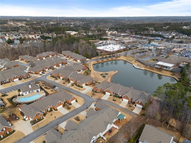 aerial view featuring a residential view and a water view