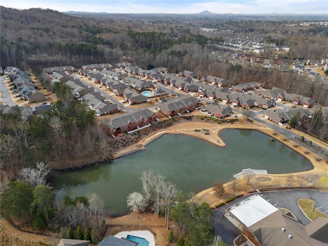 aerial view with a residential view and a water view