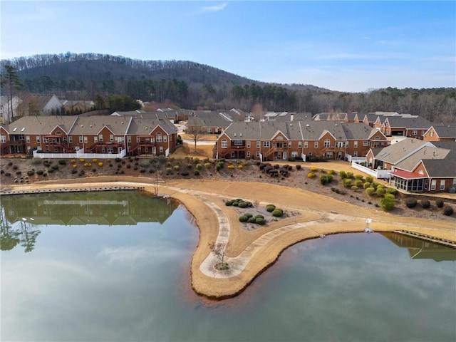 aerial view with a residential view and a water view