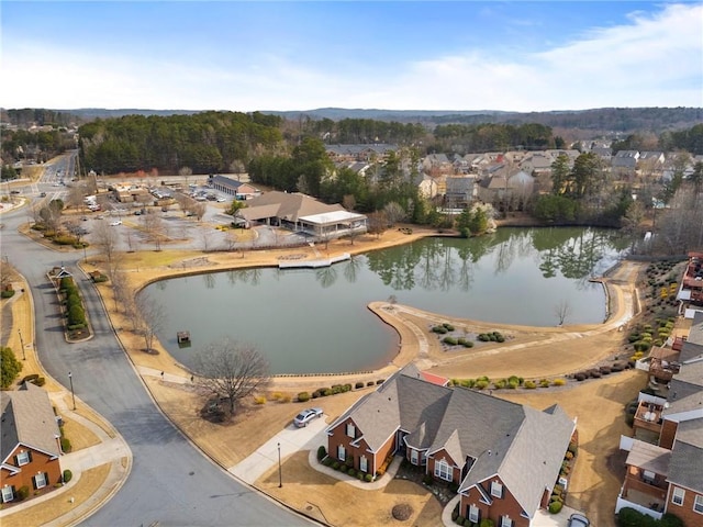 bird's eye view featuring a residential view and a water view