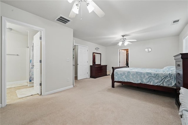 2545 Gatewater Ct, Cumming, GA 30040 - bedroom featuring light carpet, baseboards, ceiling fan, and ensuite bathroom