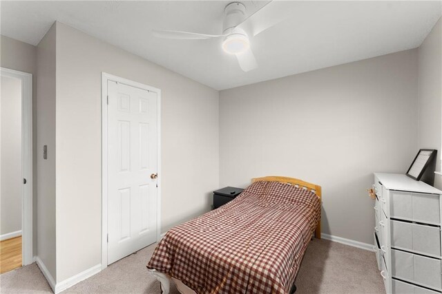 1283 Woodleigh Rd SW, Marietta, GA 30008 - bedroom featuring ceiling fan and light carpet