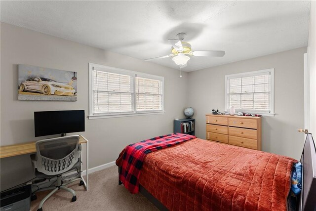 1283 Woodleigh Rd SW, Marietta, GA 30008 - bedroom with carpet and ceiling fan
