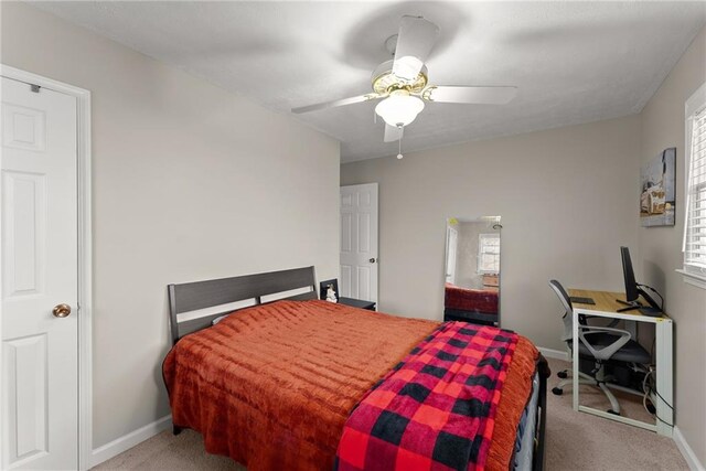 1283 Woodleigh Rd SW, Marietta, GA 30008 - bedroom with ceiling fan and carpet floors