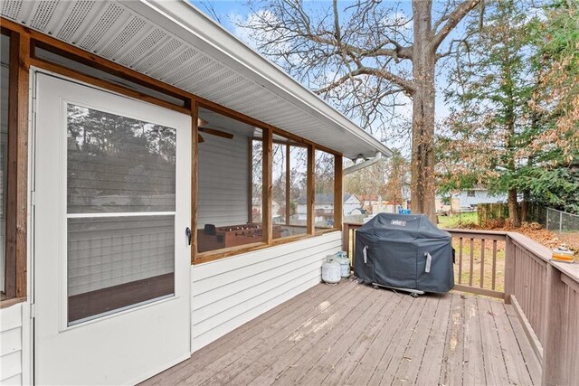 1283 Woodleigh Rd SW, Marietta, GA 30008 - wooden terrace featuring a sunroom and a grill