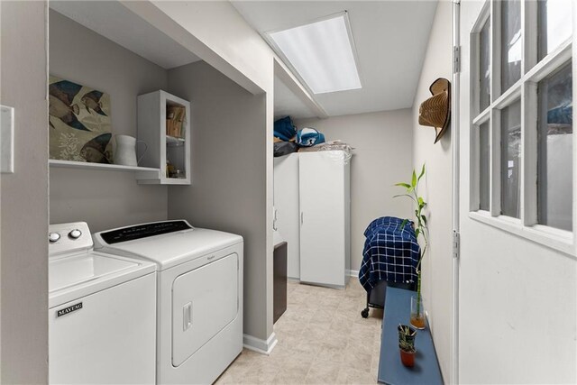 1283 Woodleigh Rd SW, Marietta, GA 30008 - clothes washing area with washing machine and dryer