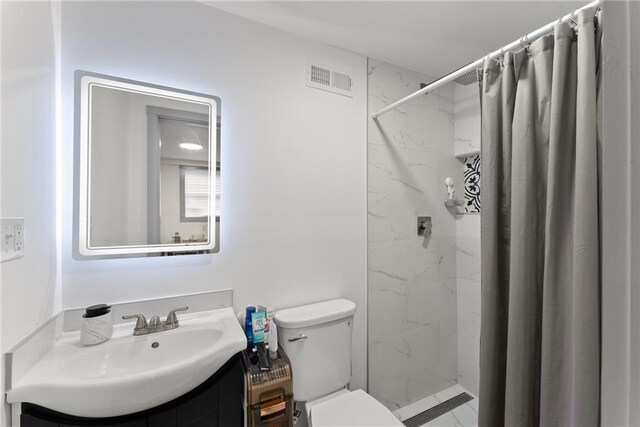 1283 Woodleigh Rd SW, Marietta, GA 30008 - bathroom featuring a shower with shower curtain, vanity, and toilet