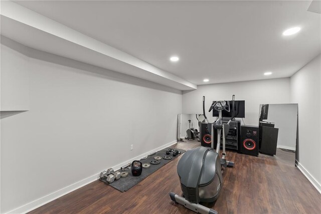1283 Woodleigh Rd SW, Marietta, GA 30008 - workout area with dark wood-type flooring