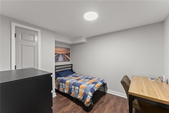 1283 Woodleigh Rd SW, Marietta, GA 30008 - bedroom with dark hardwood / wood-style floors