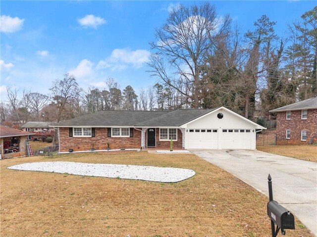 1283 Woodleigh Rd SW, Marietta, GA 30008 - ranch-style house with a front yard and a garage