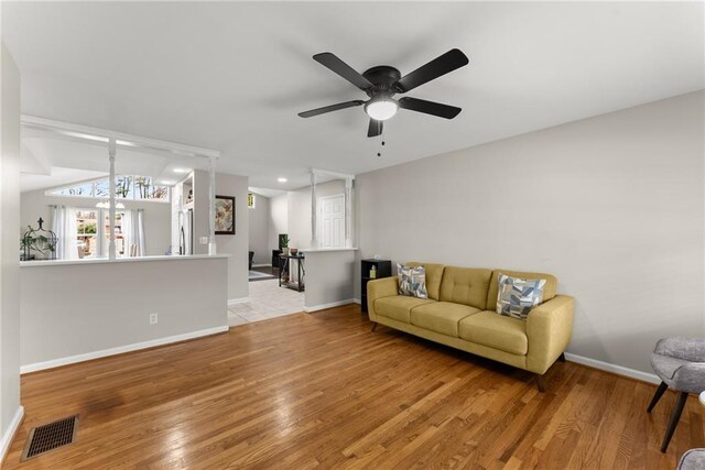 1283 Woodleigh Rd SW, Marietta, GA 30008 - living room with ceiling fan and light hardwood / wood-style floors