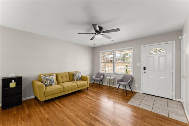 1283 Woodleigh Rd SW, Marietta, GA 30008 - foyer entrance with light hardwood / wood-style floors and ceiling fan