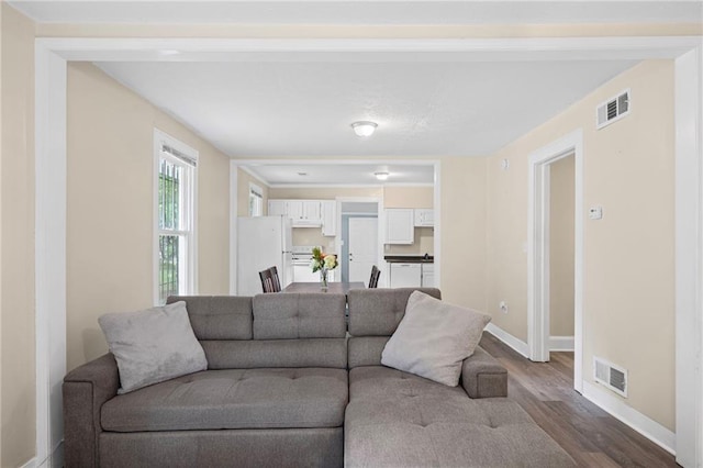1591 Jonesboro Rd SE, Atlanta, GA 30315 - living room featuring wood finished floors and baseboards